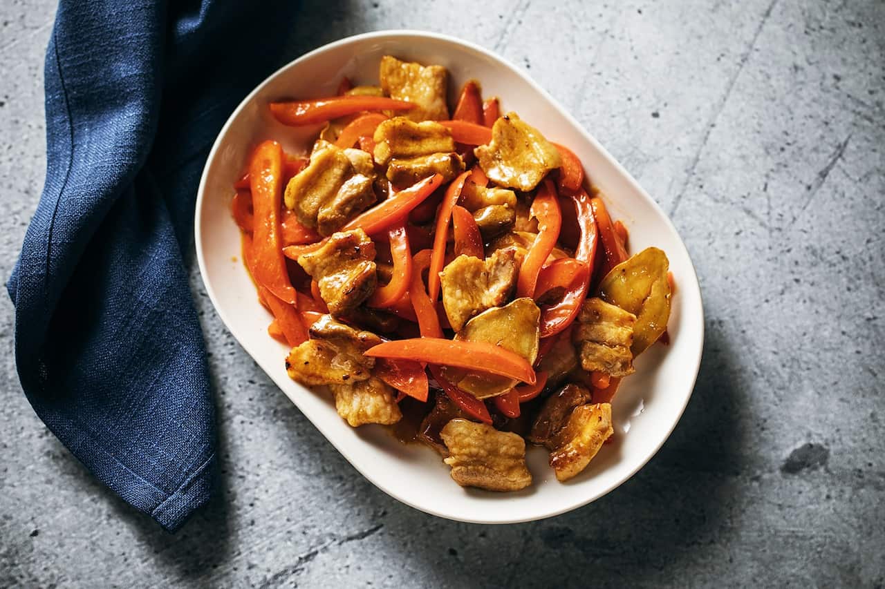 Pork belly with ginger and red capsicum