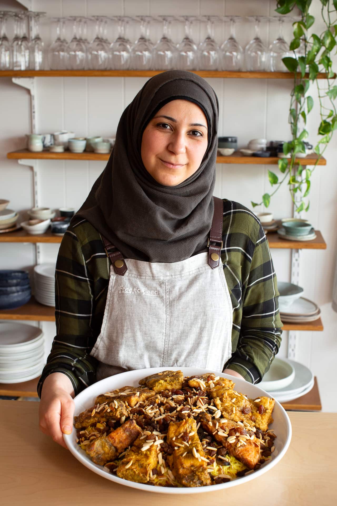 Sarah Al-Neamah with her mutabbaq samak, as part of her cooking class menu at Free to Feed.