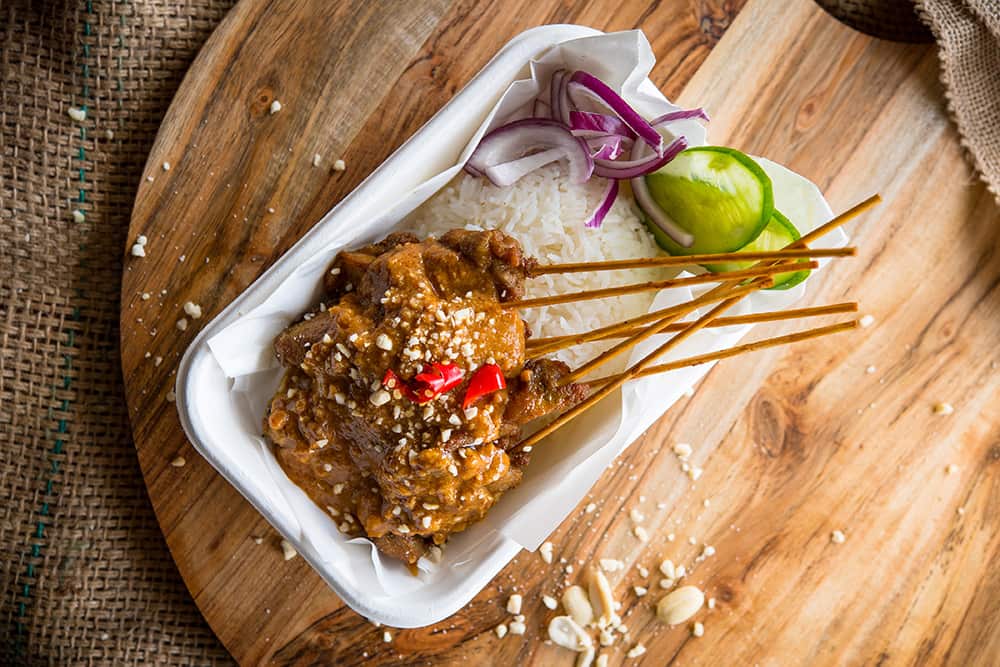 Satay Bros' satay chicken with coconut rice.