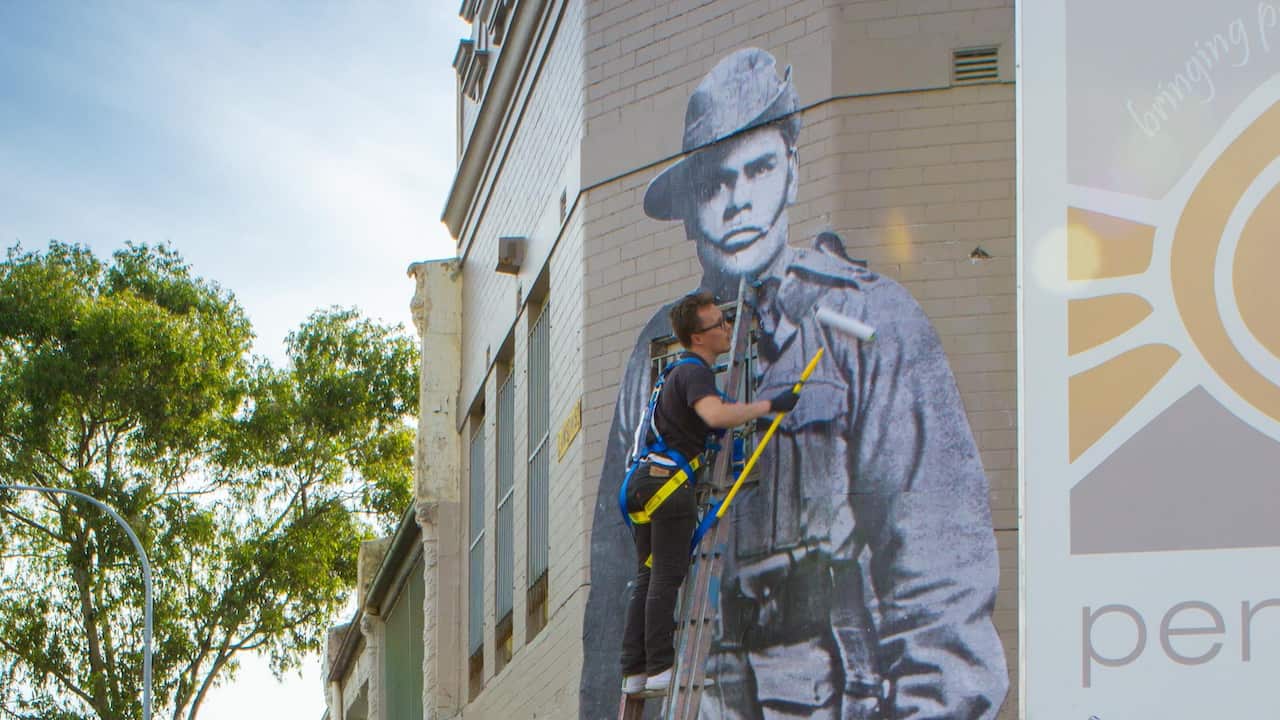 Hego, black anzac mural