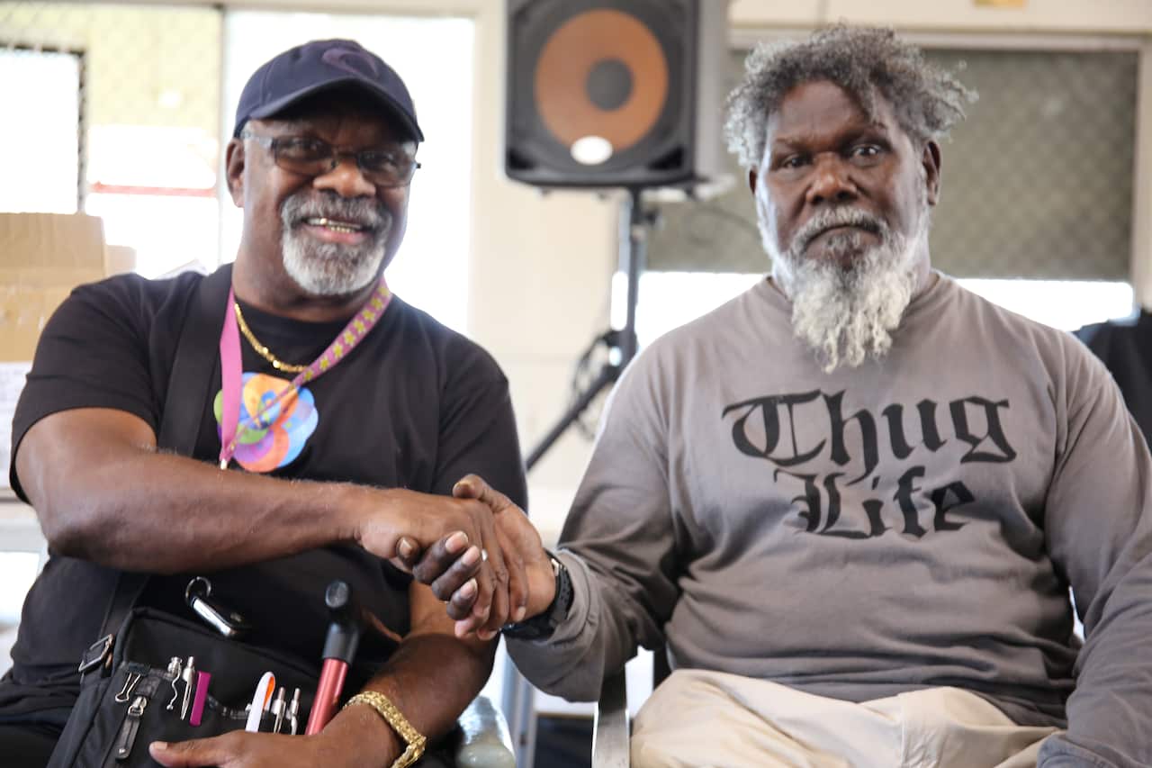 Healing Foundation projects officer Frank Cook and Kaurareg Native Title Aboriginal Corporation chair Milton Savage.