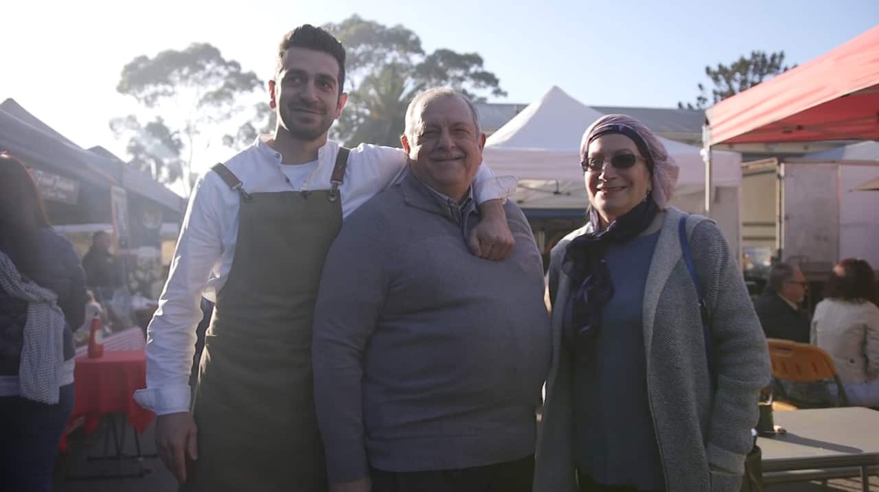 Mo Amin with his parents at Orange Grove Market