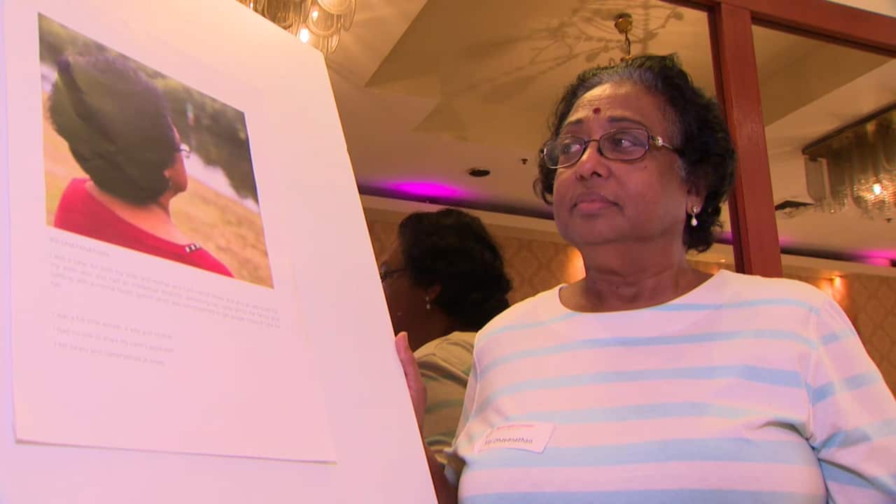 Viji Dhayanathan is one of seventeen women to display her photos at the photovoice exhibit in a bid to curb the stigma surrounding mental illness.
