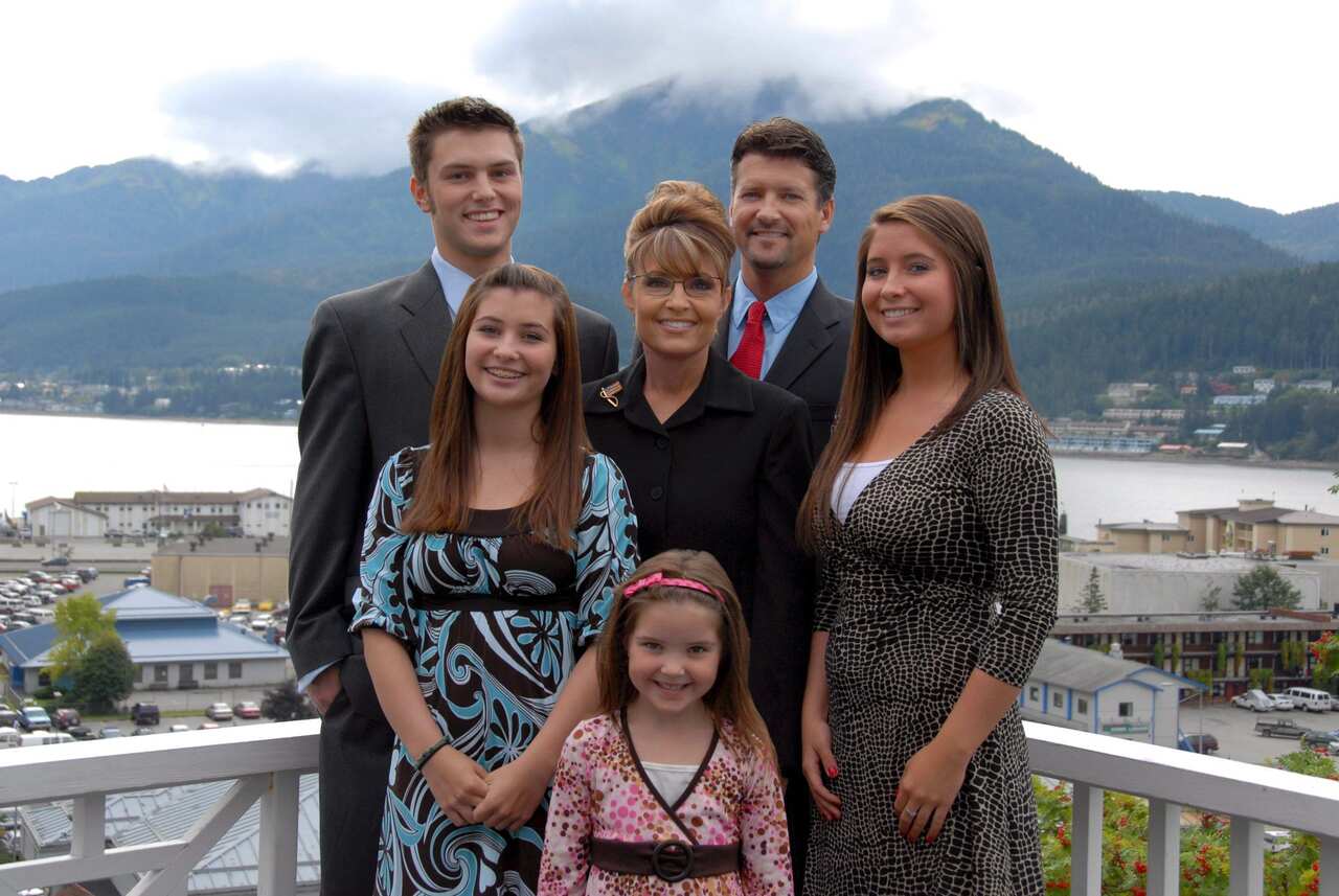 File photo of Alaska Governor Sarah Palin (C) L-R back row: son Track and  husband Todd, second row: daughter Willow,daughter Bristol, at front daughter Piper. 