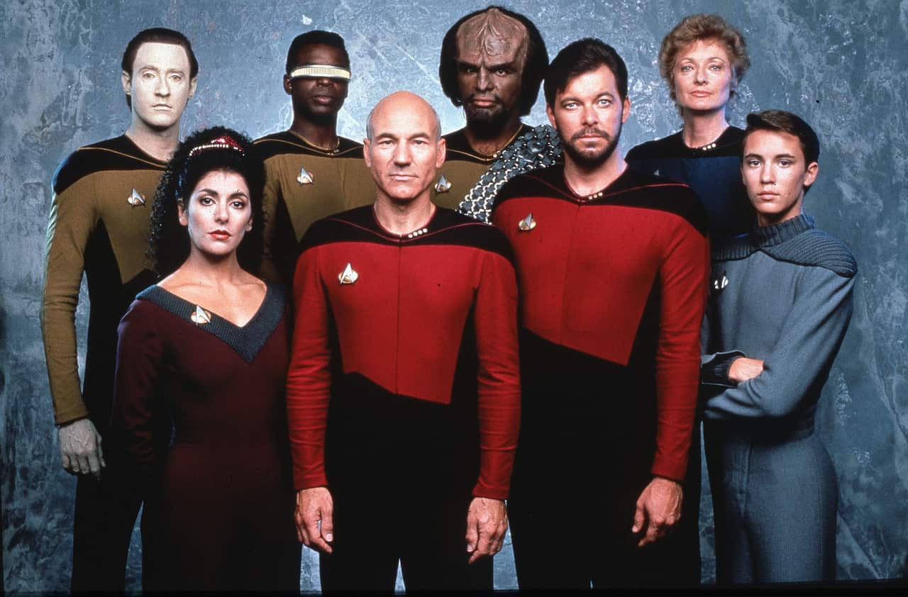 STAR TREK THE NEXT GENERATION [TV] Brent Spinner, Marina Sirtis, Levar Burton, Patrick Stewart, Michael Dorn, Jonathan Frakes, Diana Muldaur and Wil Wheaton  Paramount Television
