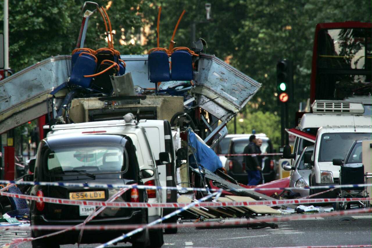 The wreckage of a double-decker bus with its top blown off at Tavistock Square