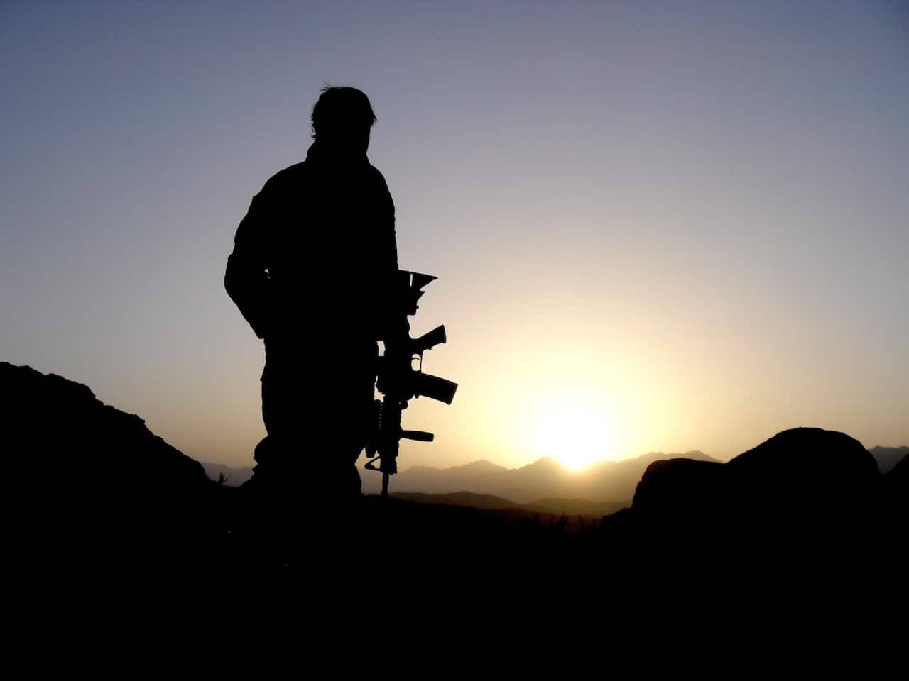 An Australian Special Operations Task Group soldier observing the valley during the Shah Wali Kot Offensive. 