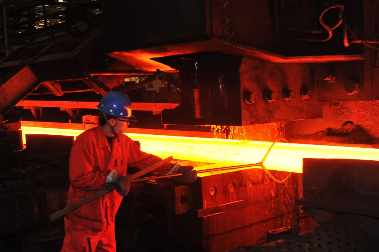 A Chinese worker produces a steel bar at a steel plant of Dongbei Special Steel Group Co., Ltd. in Dalian city, northeast Chinas Liaoning province.