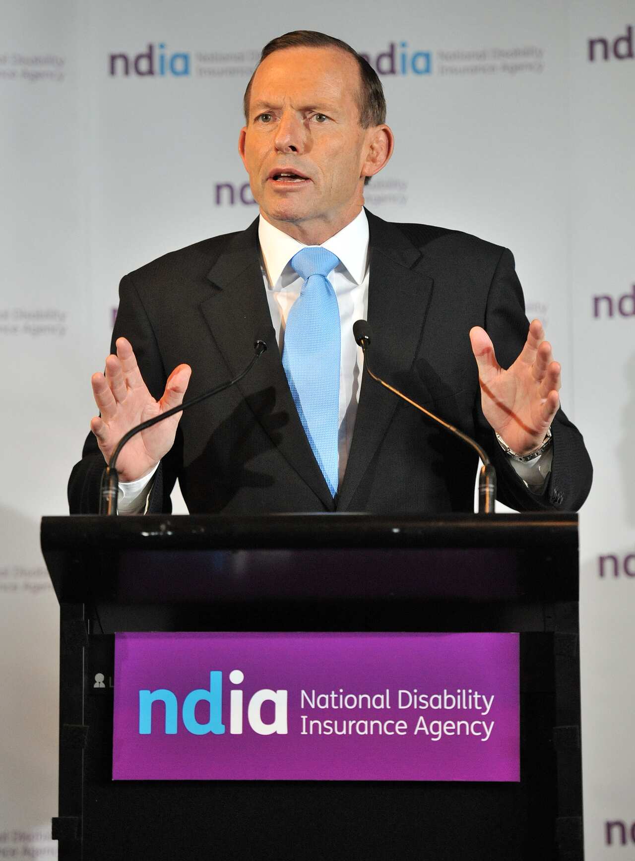 Prime Minister Tony Abbott addresses an audience at the Sheraton Hotel in Geelong, Wednesday, April 30, 2014. Mr Abbott was in Geelong to open the National Disability Insurance Agency headquarters. (AAP)
