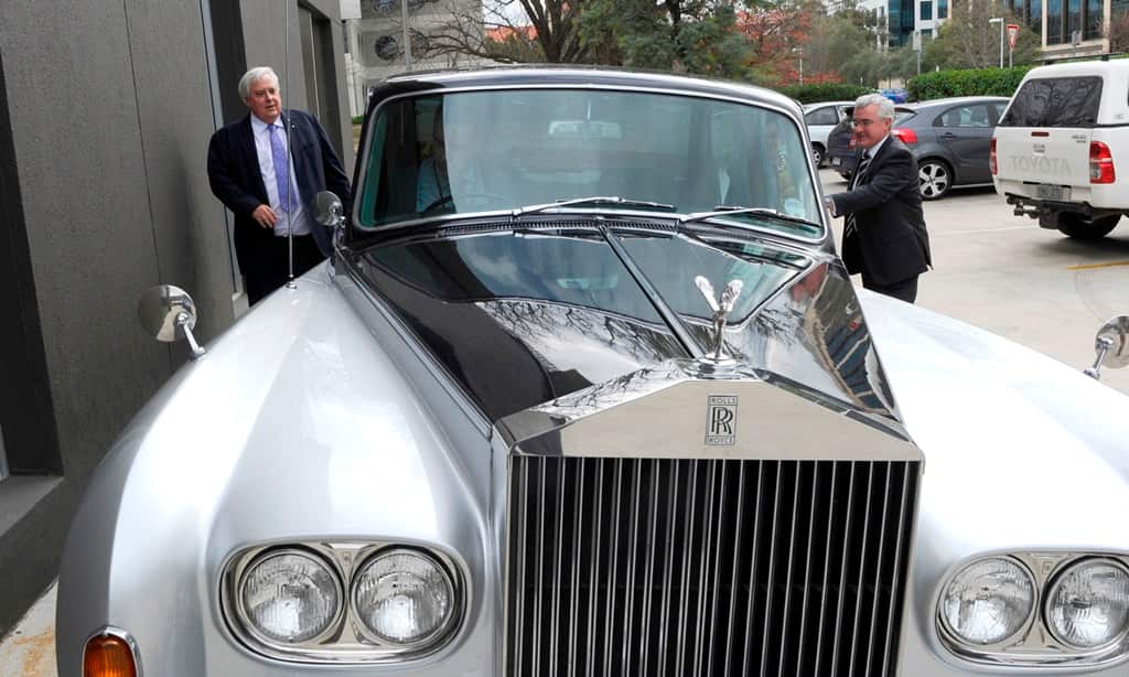Clive Palmer and Andrew Wilkie with Mr Palmer's Rolls Royce Phantom at the National Press Club in Canberra Tuesday May 27, 2014. Mr Palmer had lunch with independents Andrew Wilkie and Cathy McGowan at the club. (AAP)