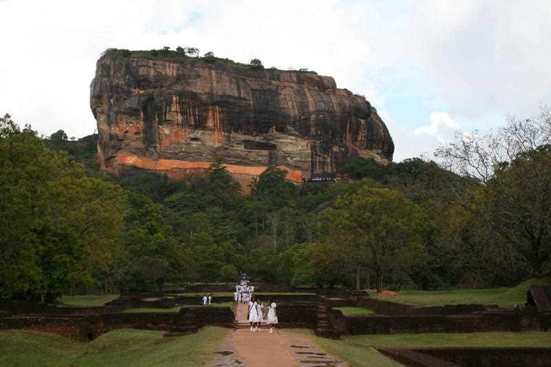 Pidurangala Rock is near the ancient city of Sigiriya (pictured)