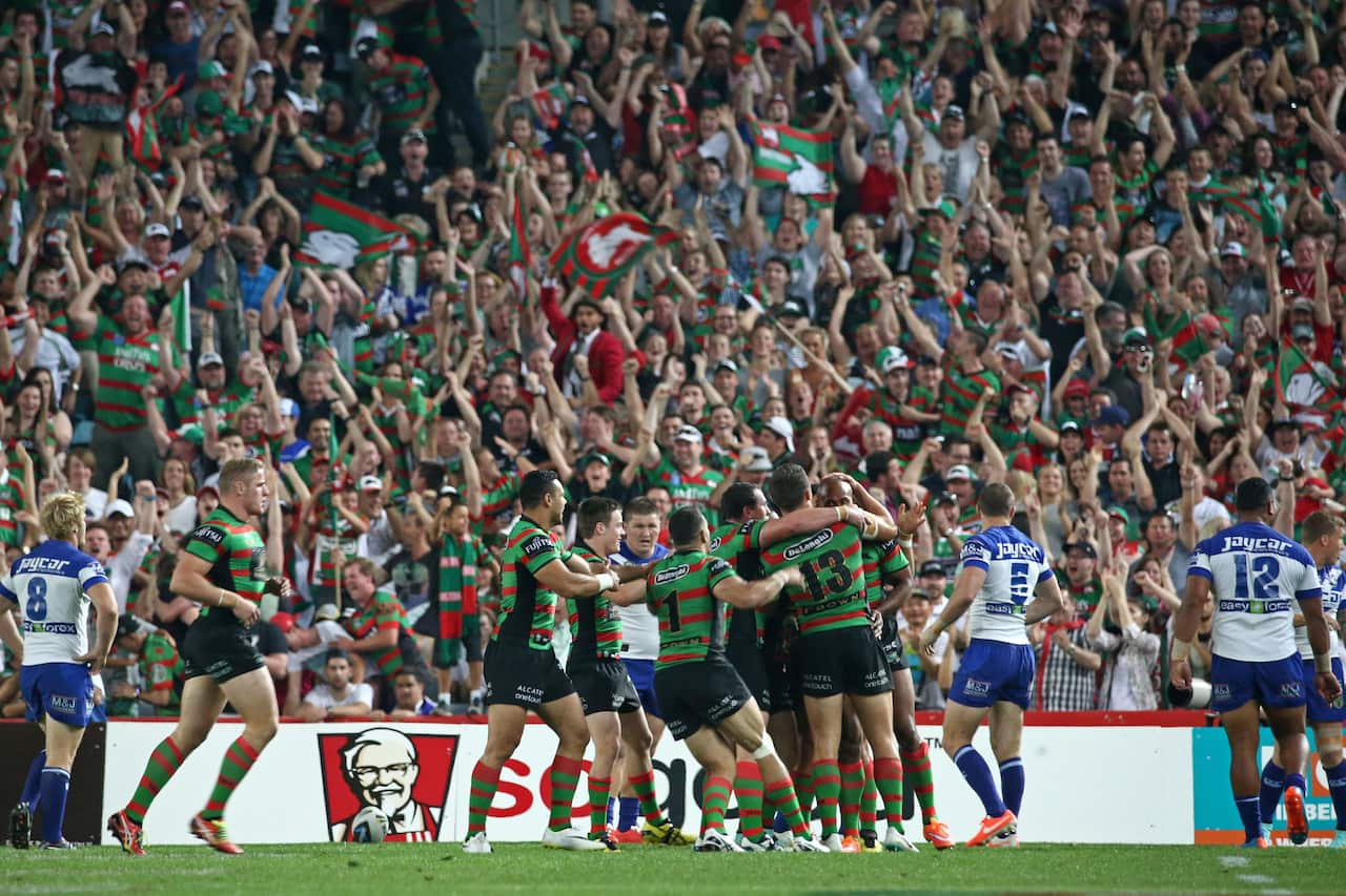 South Sydney Rabbitohs celebrate before a euphoric crows. (AAP)