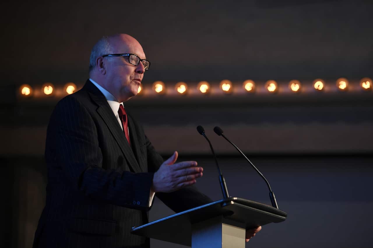 Attorney-General George Brandis has introduced a series of laws that further limit what the media may report. (AAP/Lukas Coch)