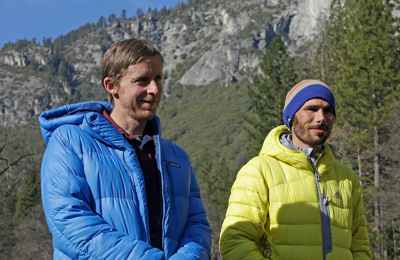 Tommy Caldwell, left, and Kevin Jorgeson became the first in the world to use only their hands and feet to scale El Capitan, a sheer granite face in California's Yosemite National Park. (AP Photo/Ben Margot)