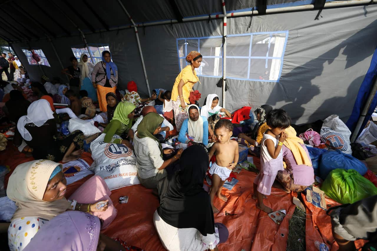 Violent clashes and 'maritime ping-pong' as nations turn Rohingya away