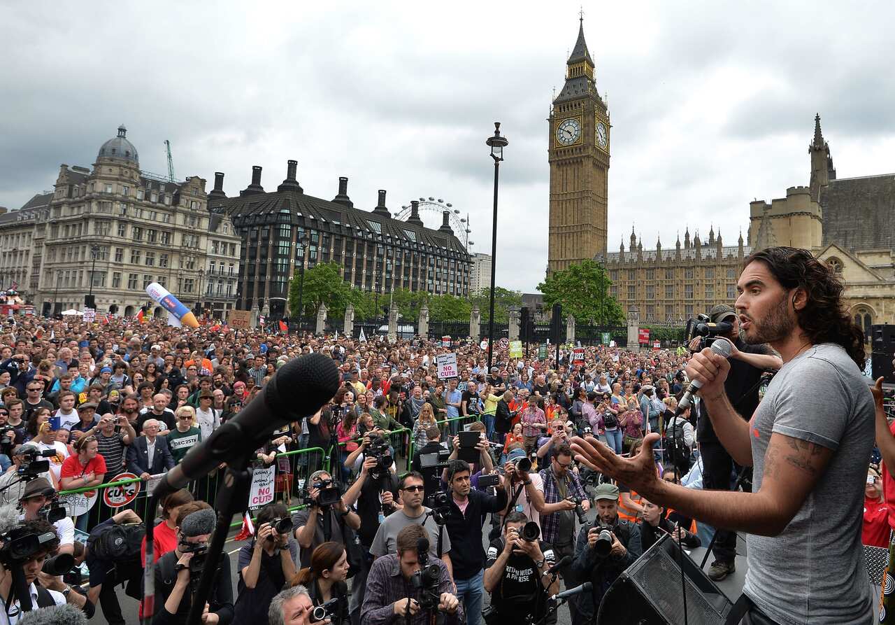 Russell Brand speaks at the End Austerity Now rally in Parliament Square, London.. Picture date: Saturday June 20, 2015. See PA story INDUSTRY Protest. Photo credit should read: John Stillwell/PA Wire
