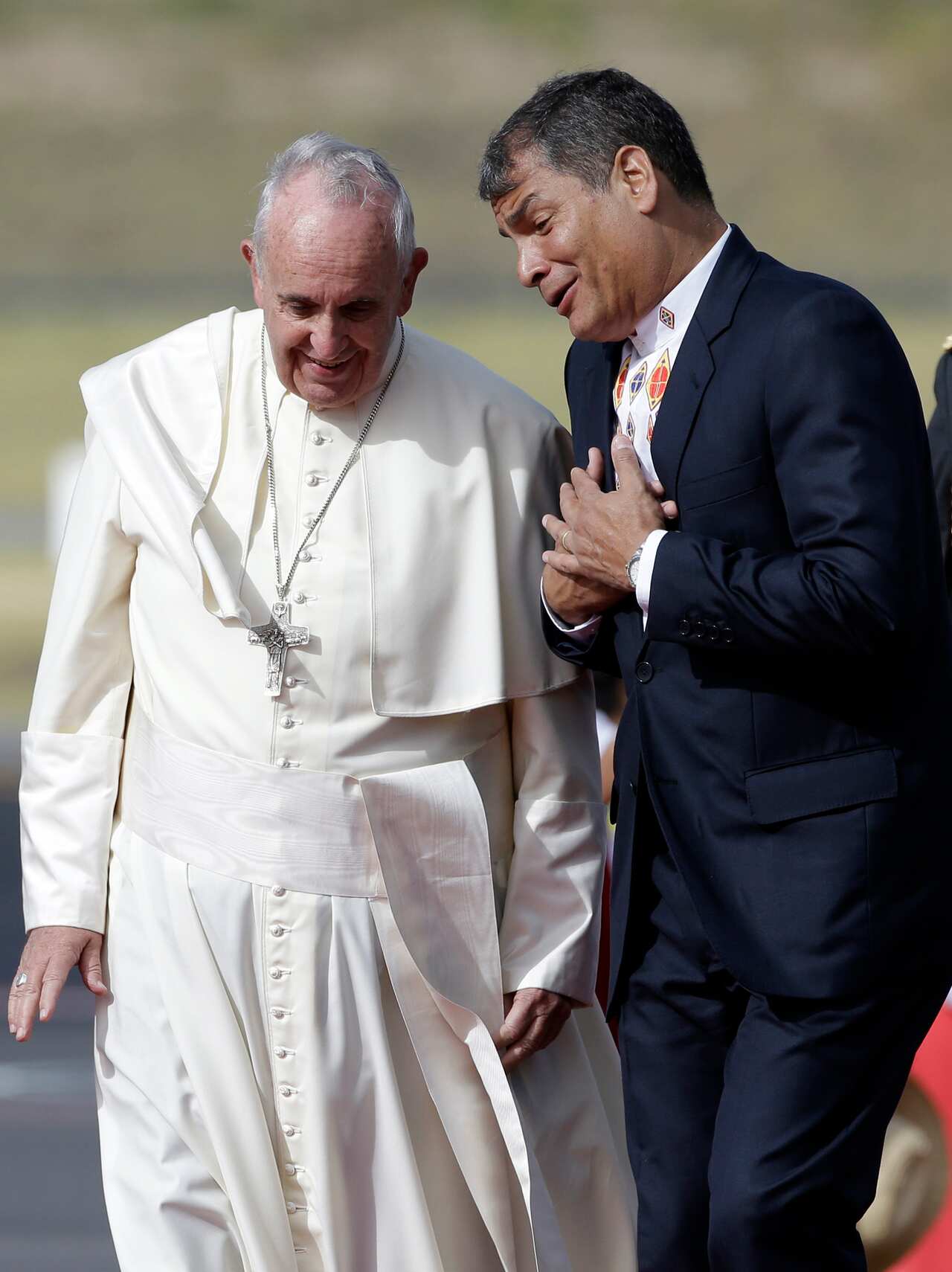 Ecuador's President Rafael Correa greets Pope Francis