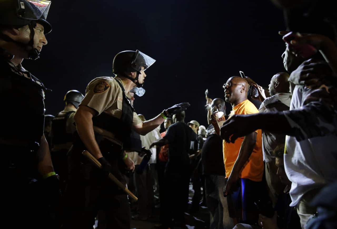 Protesters used their mobile phones to record interactions with police during the protests in Ferguson.
