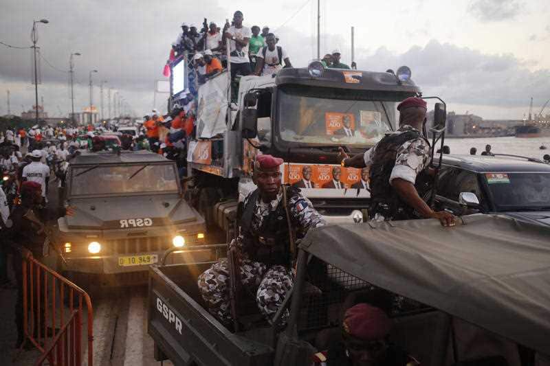 Ivory Coast troops provide security during a election rally of Ivory Coast incumbent President Alassane Ouattara in Abidjan 