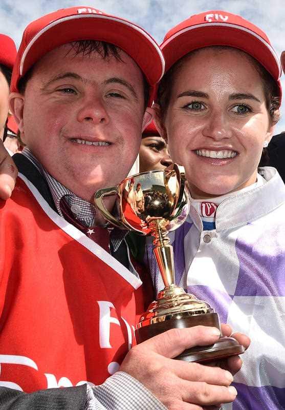 Steven (left) and Michelle Payne celebrate after Michelle rode Prince of Penzance to victory in the Melbourne Cup.