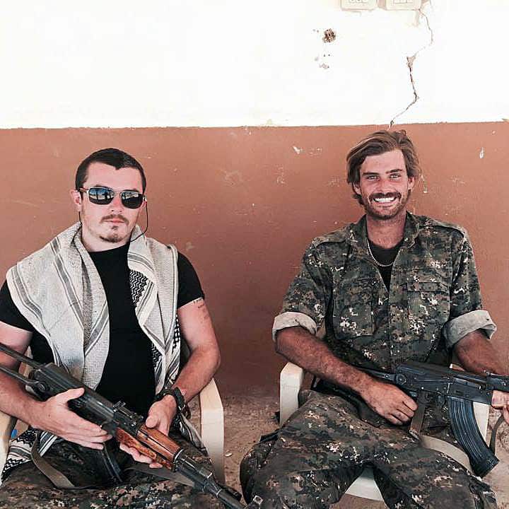 Supplied undated image obtained Friday, Dec. 4, 2015 of Queensland man Ashley Dyball (left), also known as Mitchell Scott, posing for a photograph with Reece Harding, who has been fighting alongside Kurdish forces battling Islamic State in Syria. (AAP Ima