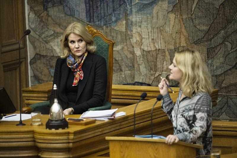 Johanne Schmidt Nielsen (R) of opposition party 'Enhedslisten' speaks as former Danish prime minister Helle Thorning Schmidt (L) during a debate in the Dansih parliament in Copenhagen, Denmark, 13 January 2016. 