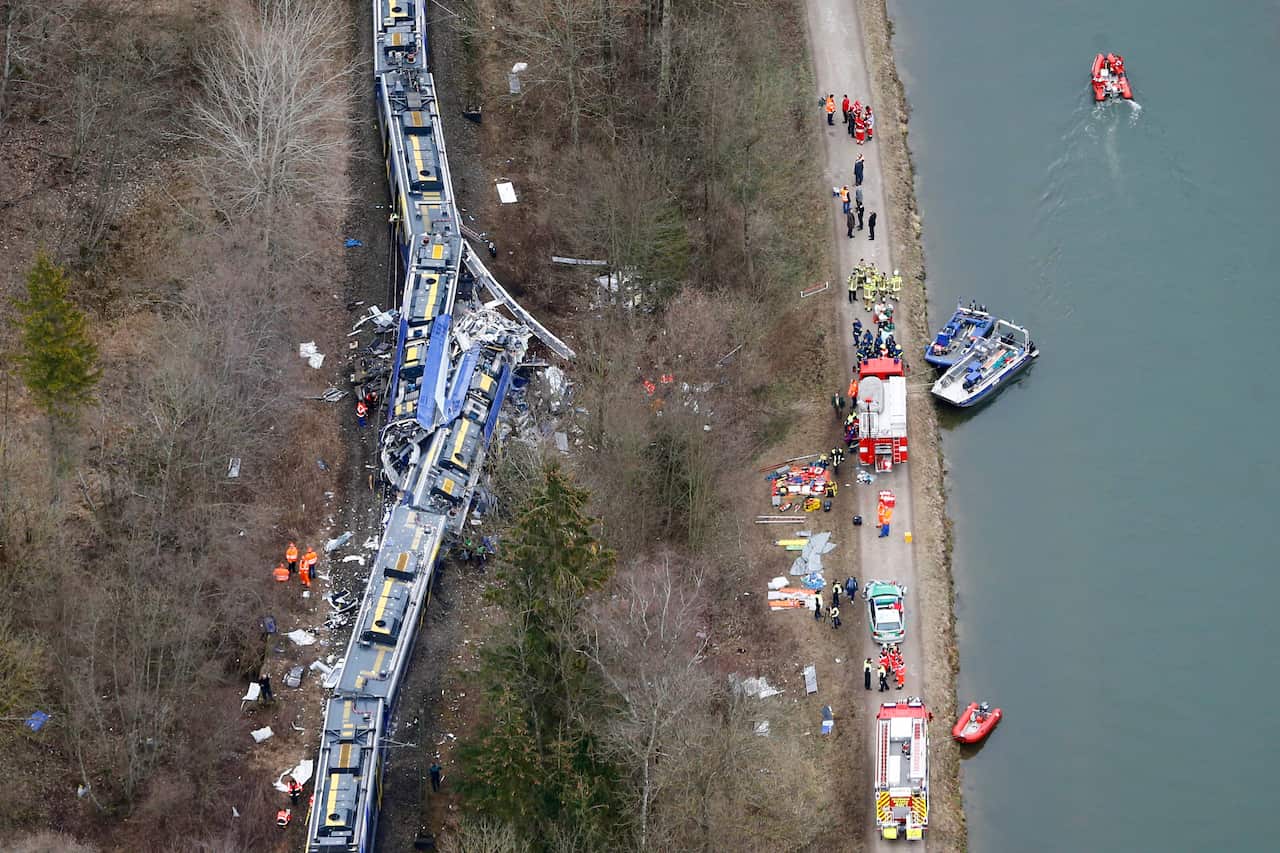 Aerial view of rescue teams at the site where two trains collided head-on near Bad Aibling, Germany, Tuesday, Feb. 9, 2016. Several people have been killed and dozens were injured. (AP Photo/Matthias Schrader)