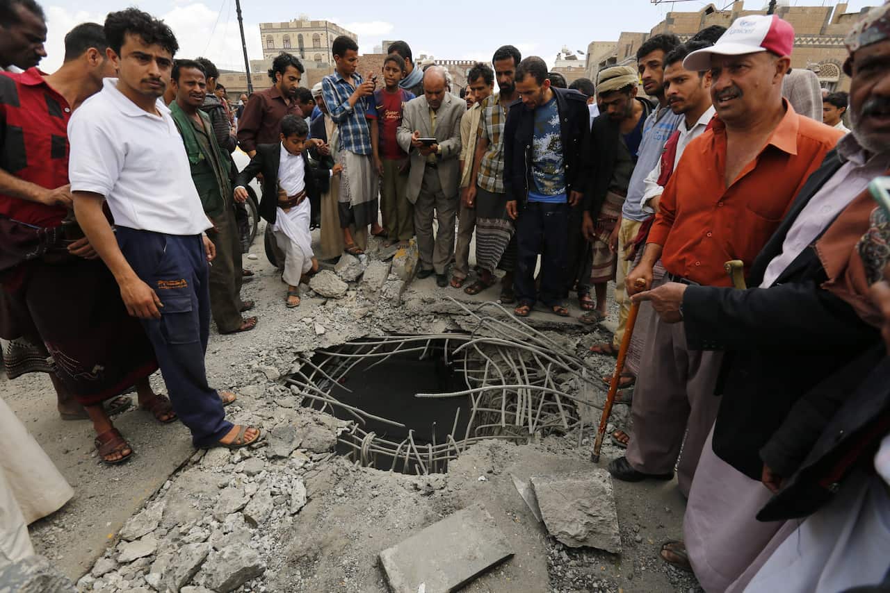 group of men, hole in road