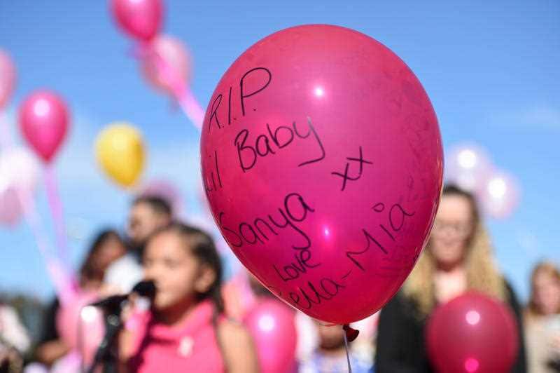 Mourners release balloons at a community vigil for murdered 14 month old Sanaya Sahib at Darebin creek, Heidelberg West, Friday, April 15, 2016. 