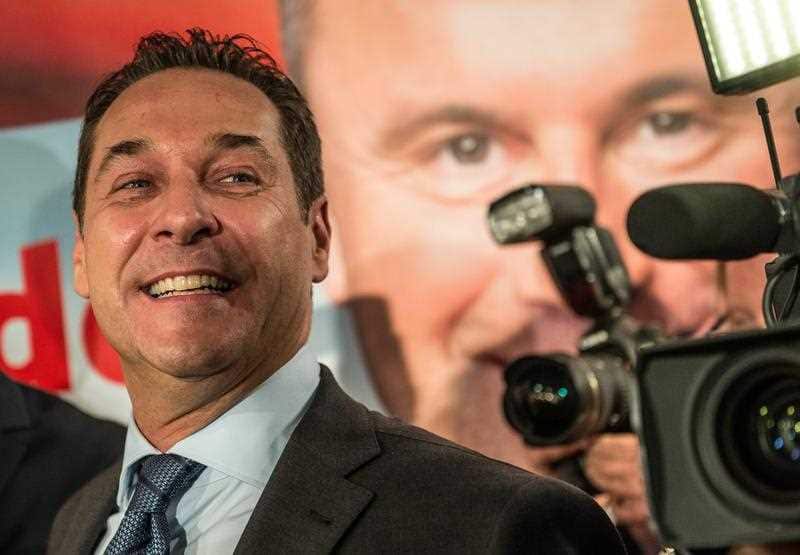 Leader of the right-wing Austrian Freedom Party (FPOe) Heinz-Christian Strache celebrates at the party headquarters 