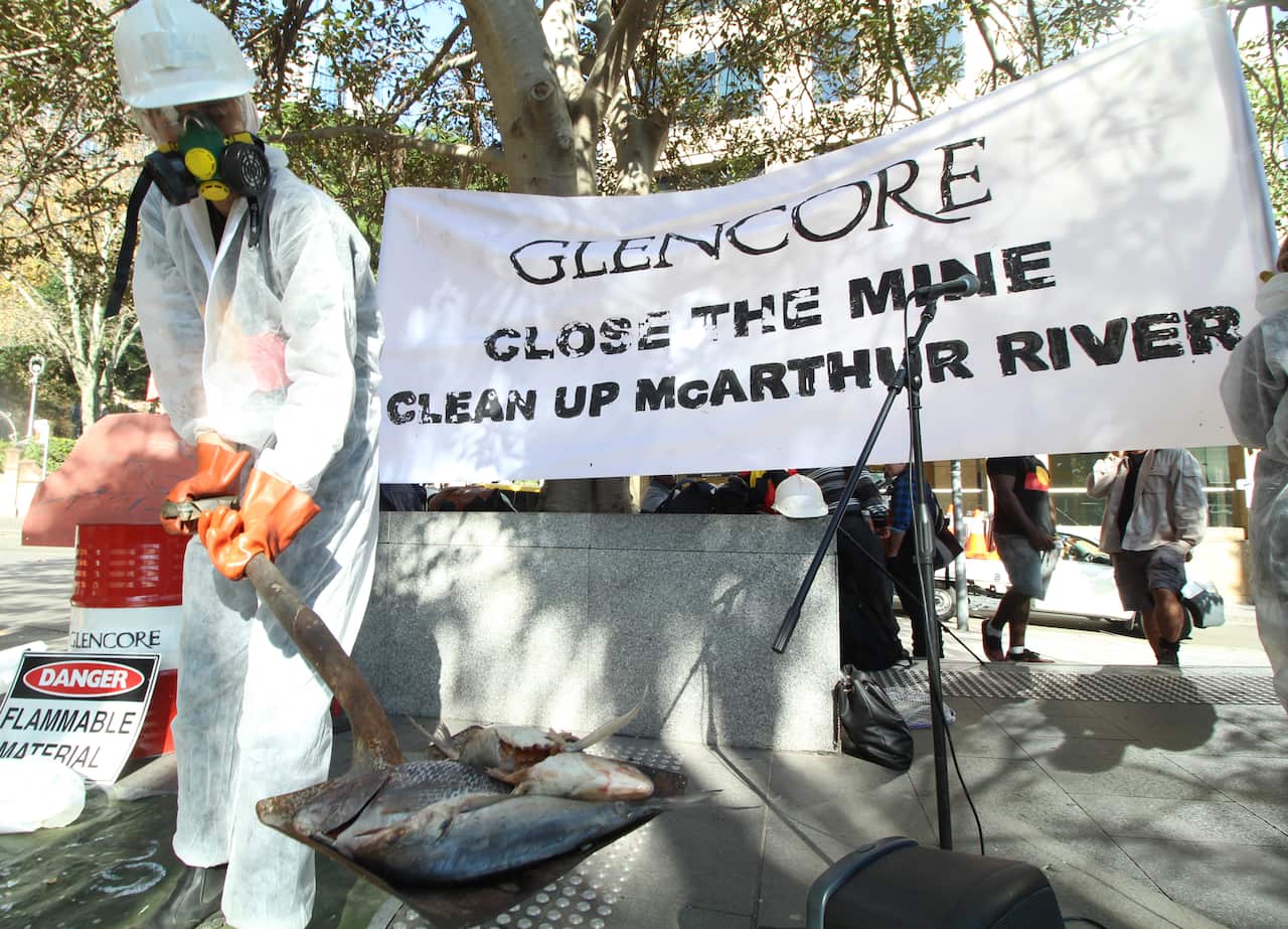 Representatives of the Northern Territory's Borroloola Indigenous clan groups are among scores of protesters in Sydney to demand miner Glencore close and clean up its McArthur River site in the Top End, May 2016.