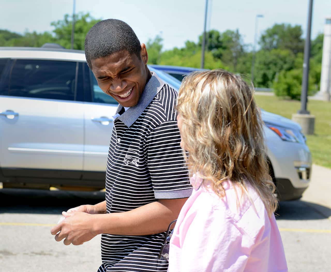 FILE: Davontae Sanford smiles as he walks out of the Bellamy Creek Correctional Facility with one of his lawyers Valerie Newman.