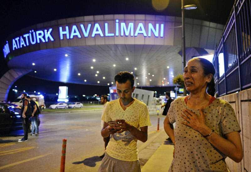 People gather on the entrance to Istanbul's Ataturk airport
