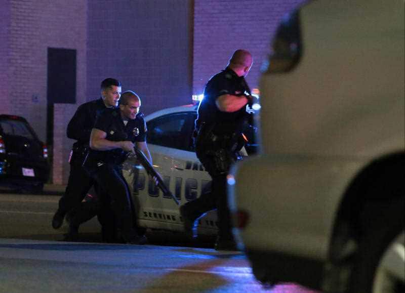 Dallas police respond after shots were fired during a protest over recent fatal shootings by police in Louisiana and Minnesota