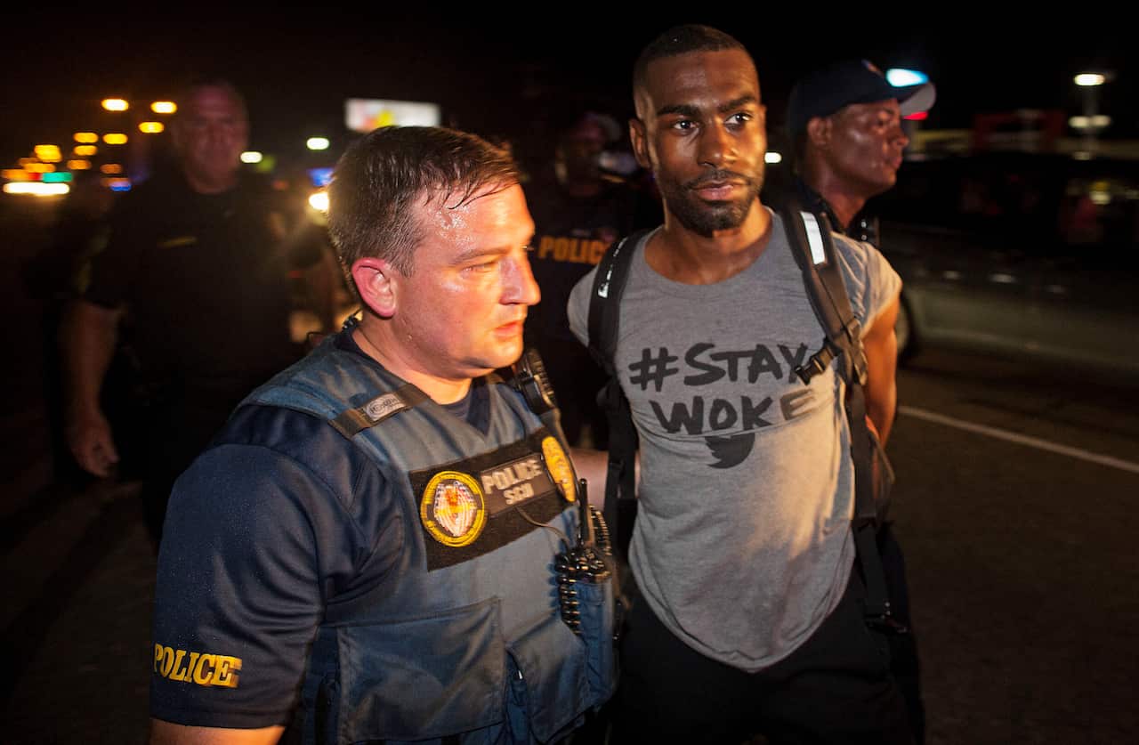 Police arrest DeRay Mckesson in 2016, during a protest along a major road that passes in front of the Baton Rouge Police Department headquarters.