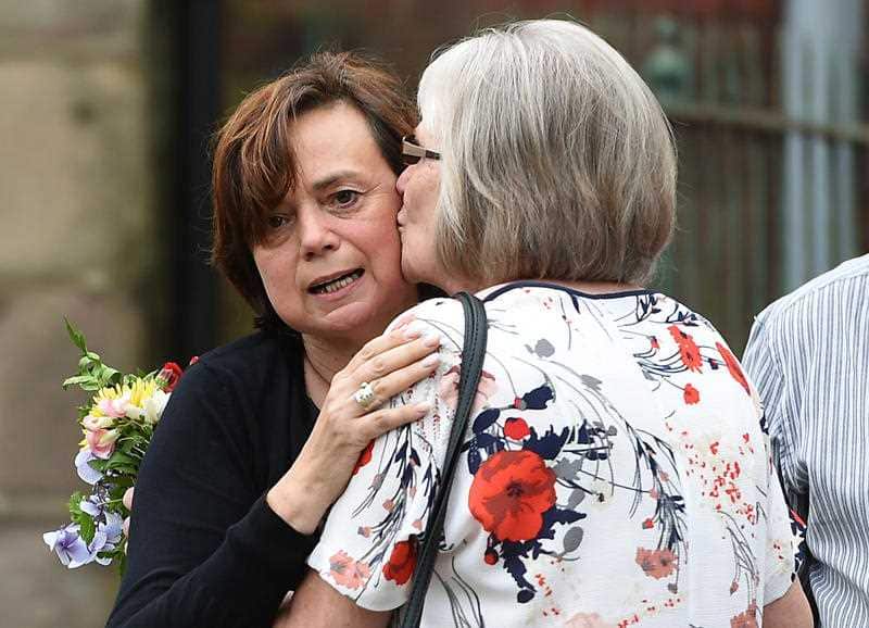 Mother Rosie Ayliffe (left) at St Mary's Church in Wirksworth, Derbyshire, for a memorial service for her daughter Mia Ayliffe-Chung