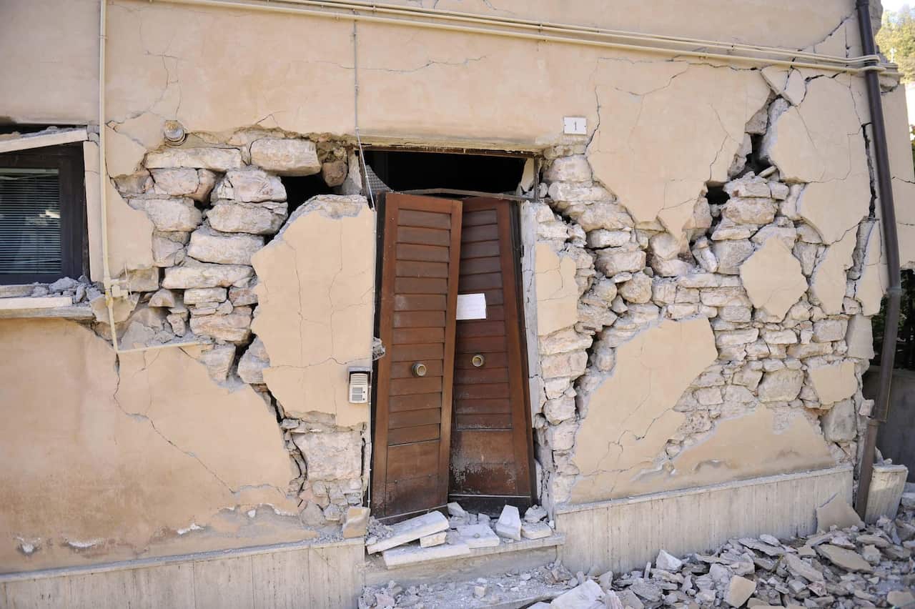 The damaged facade of a building in Visso, near Macerata, a day after two big earthquakes shook central Italy, Visso, Italy