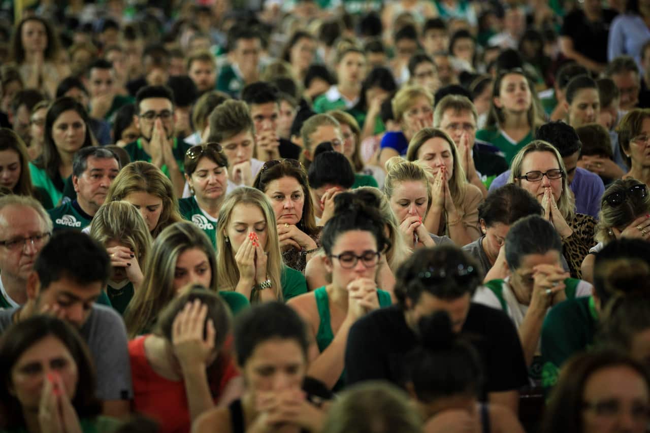 Chapecoense fans attend a mass in Chapeco, Brazil