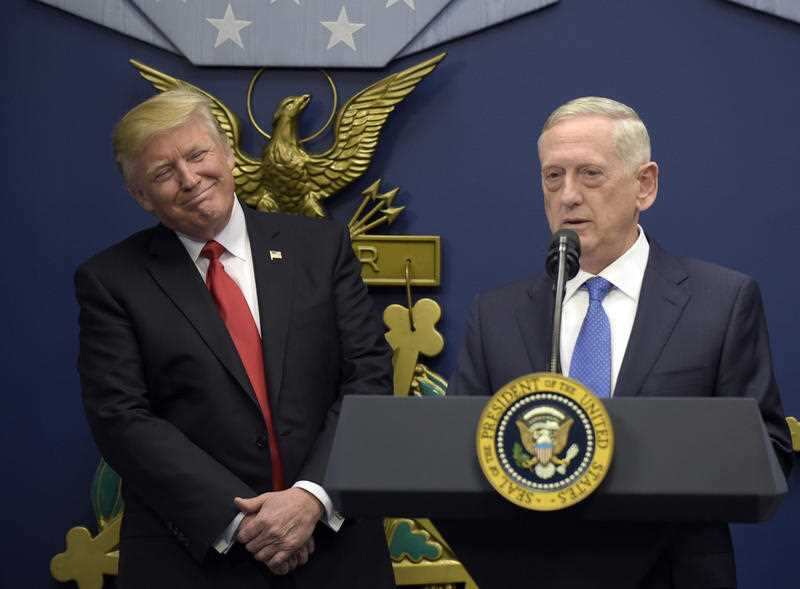President Donald Trump, left, listens as Defense Secretary James Mattis, right, speaks at the Pentagon in Washington