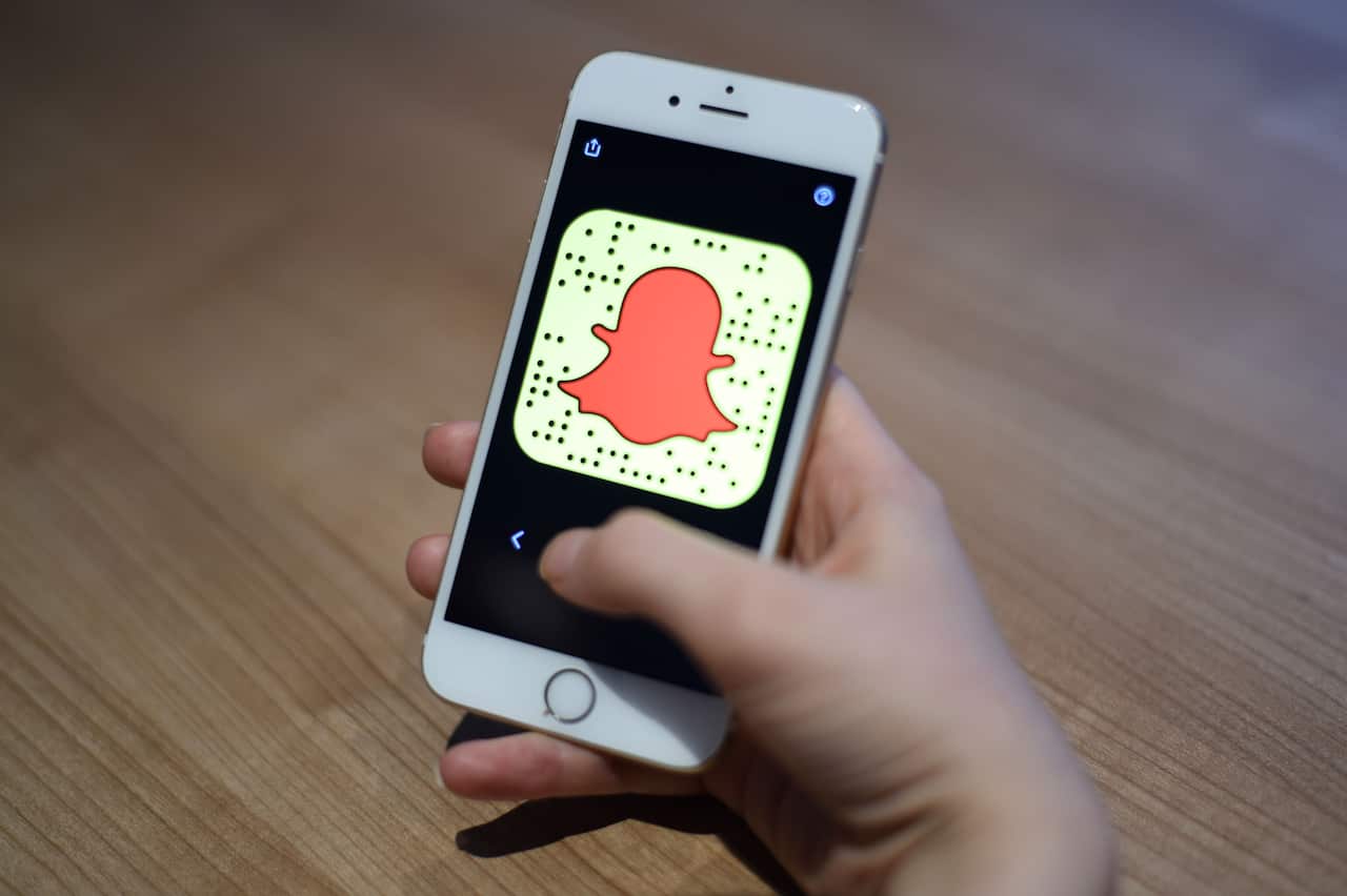 A general view of a woman holding a mobile phone with the Snapchat app.. Picture date: Friday March 3, 2017. Photo credit should read: Kirsty O'Connor/PA Wire
