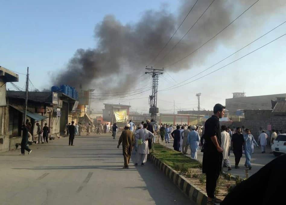 epa06045843 Smoke billows from the scene of a suicide bomb blast at Toori market in Parachinar, Pakistan, 23 June 2017. At least 15 people were killed and 30 others were injured in a suicide bomb blast in Parachinar on 23 June. EPA/STR
