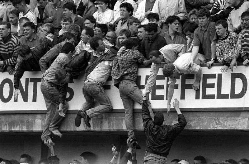 Liverpool fans trying to escape during the Hillsborough disaster at Hillsborough football stadium in Sheffield.