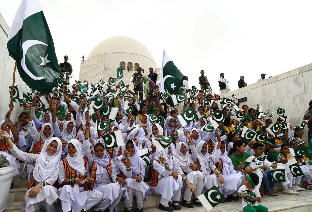 Pakistani girls attend a ceremony at the mausoleum of founder of Pakistan, Muhammad Ali Jinnah.