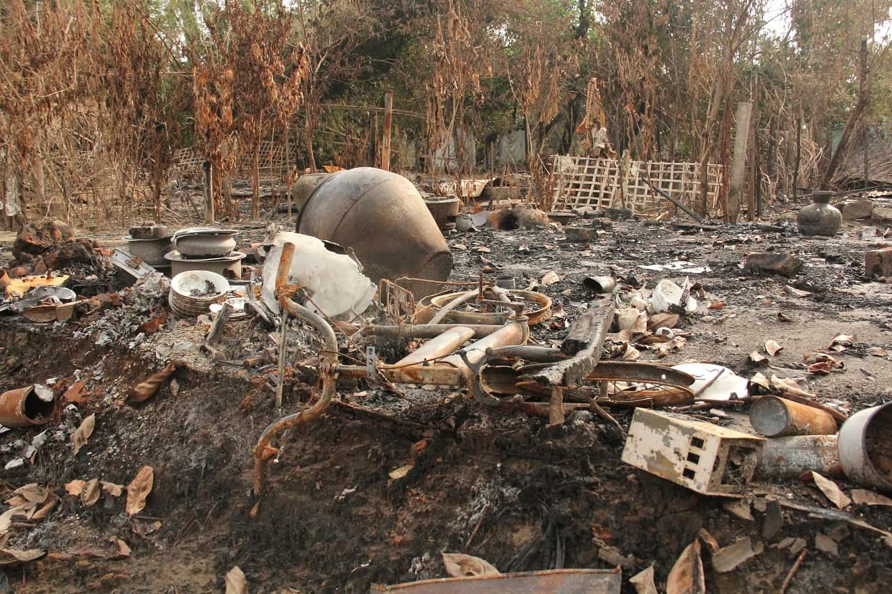 Burned Rohingya houses are seen in Ka Nyin Tan village of suburb Maungdaw, northern Rakhine state of western Myanmar, on Wednesday, Sept. 6, 2017.