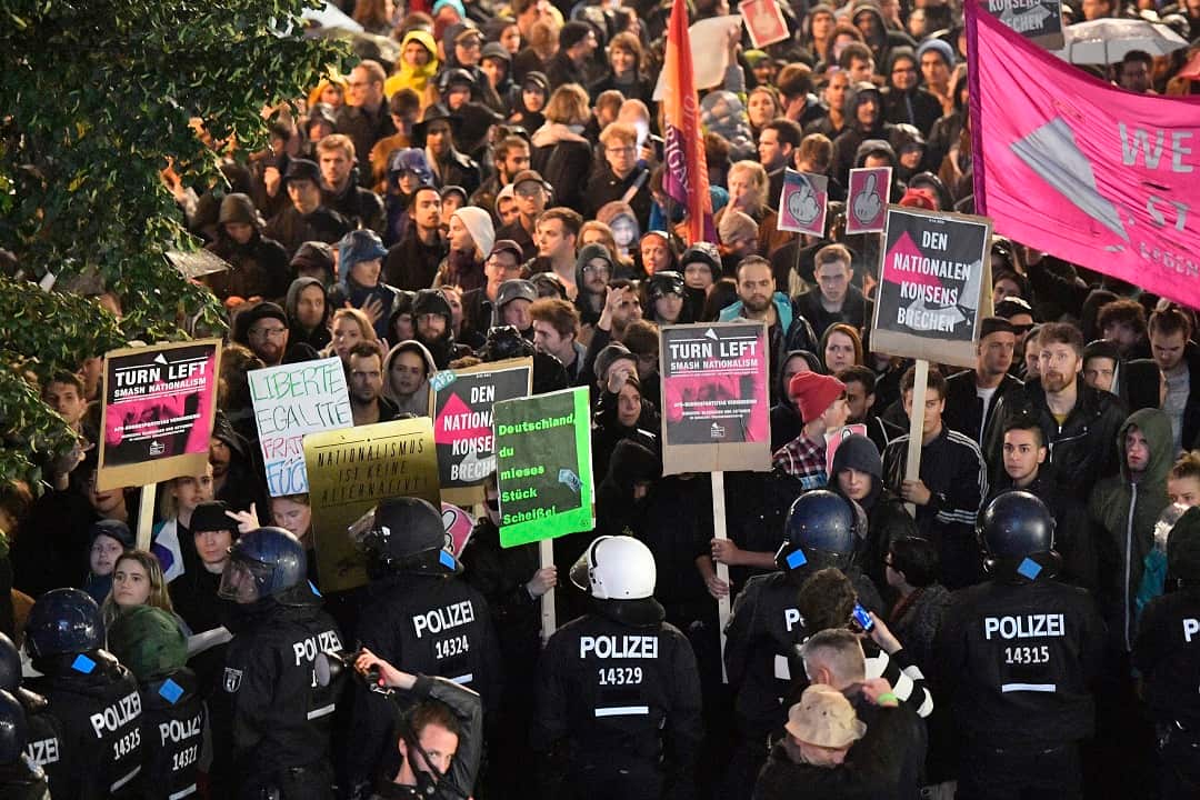 PPolice block demonstrators protesting against the nationalist 'Alternative for Germany', AfD, party in Berlin.