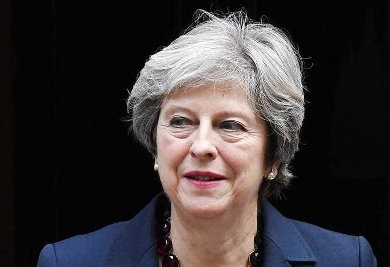 British Prime Minister Theresa May departs 10 Downing Street for Prime Minister Questions at parliament in London, Britain, 25 October 2017.