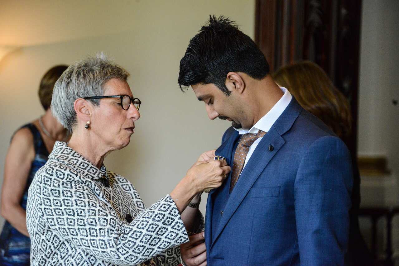 Muhammad Usman receiving a bronze medal for bravery