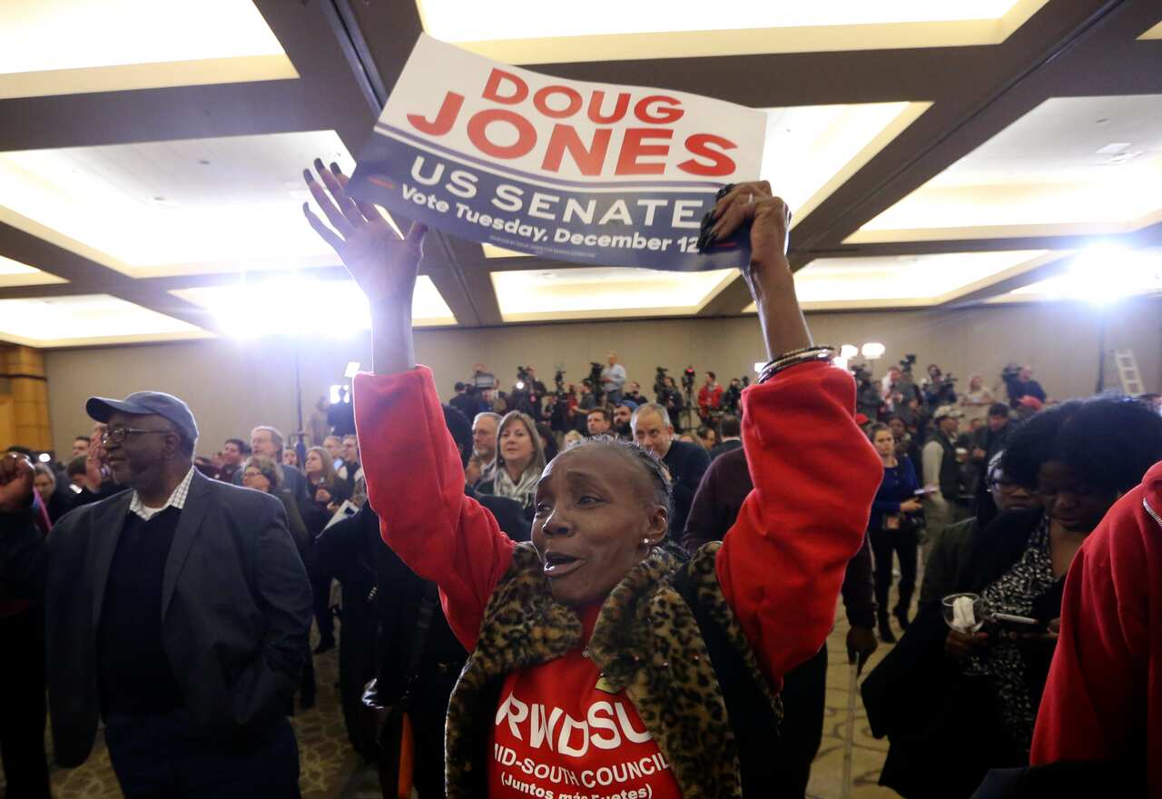 A Doug Jones supporter at an election night party in Alabama on 12 December 2017.