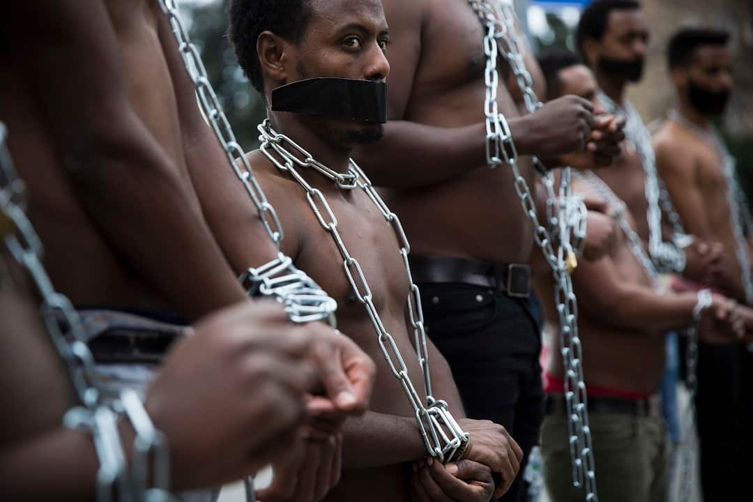 Eritrean migrants protest at the Knesset, Israel's parliament, in Jerusalem.
