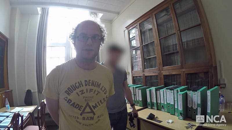 Still from Matthew Falder's arrest 